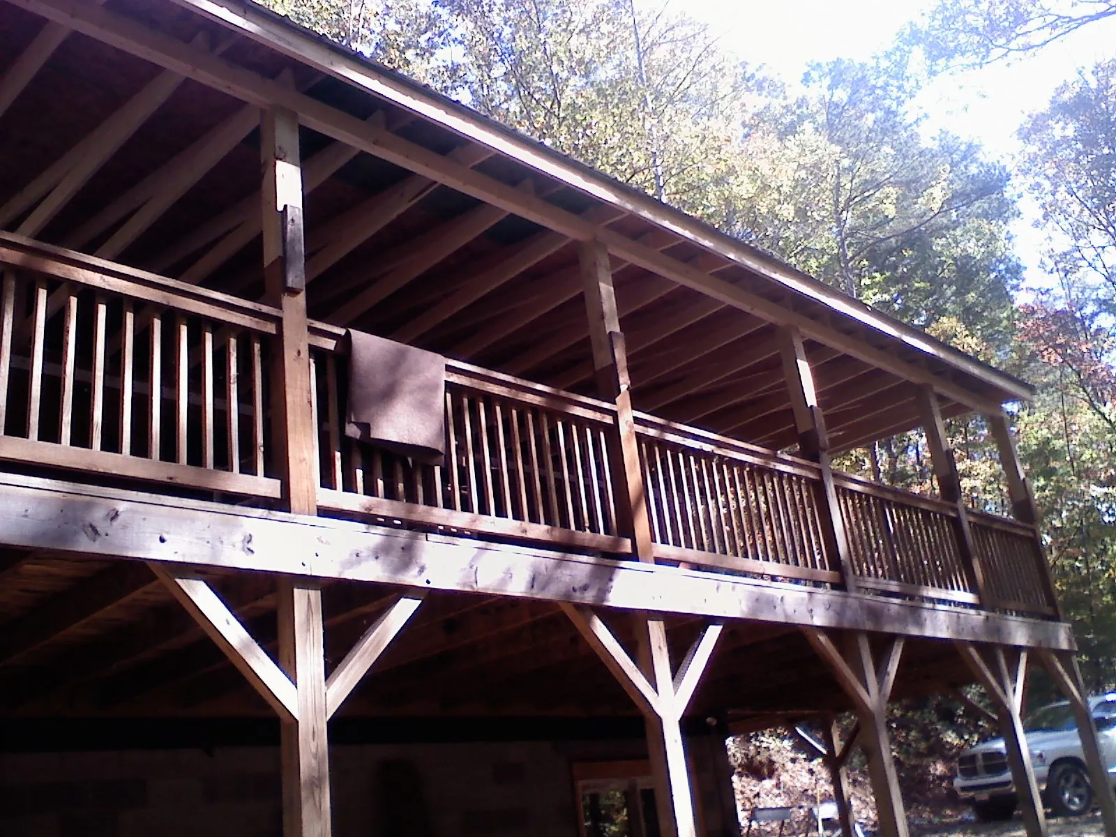 Timber framing under a new elevated porch and deck — Roof Leak Repair in Sea Cliff by Roofing Brothers